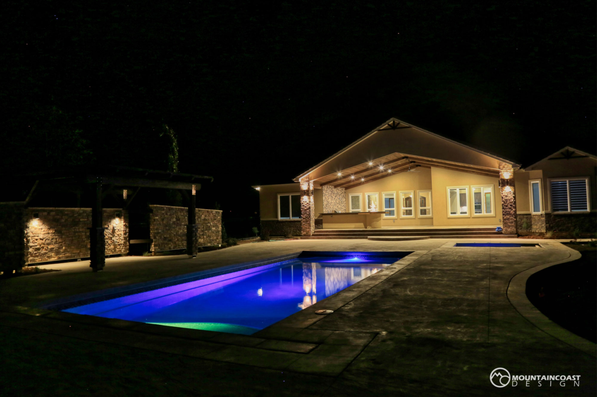 Pool and House at night.